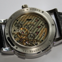 A. Lange & Söhne Lange 1 Zeitzone 950er Platin 116.025 Herrenuhr B&P